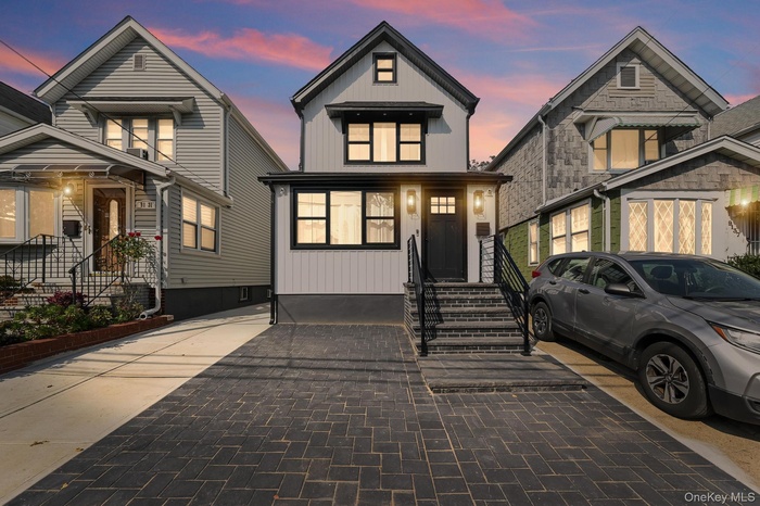 View of front of property with board and batten siding