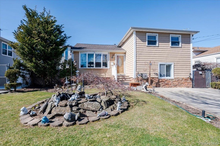 Back of property with entry steps