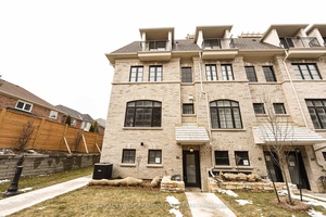 Rare brand new Luxury Townhome END LOT with a 2 car parking lift !