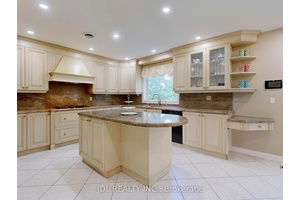 Discover an exceptional THREE CAR GARAGE residence in one of Richmond Hill's most prestigious enclaves.