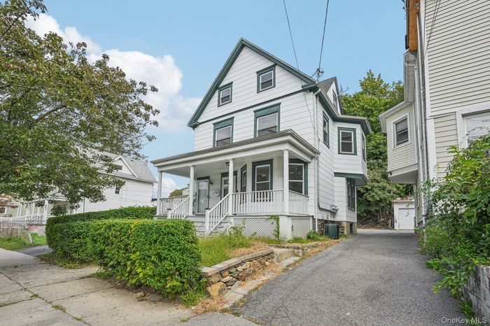 View of front of home with covered porch