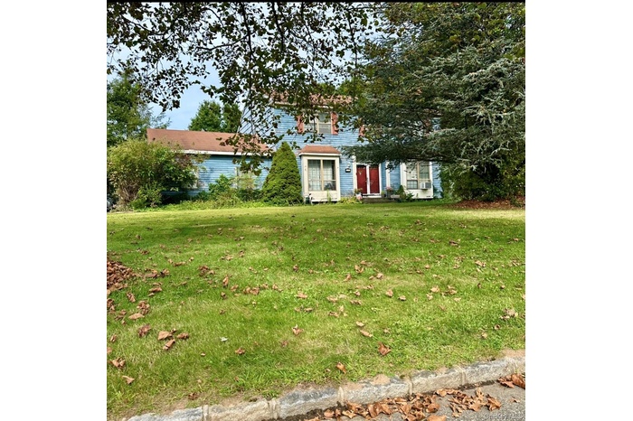View of front of house featuring a front lawn