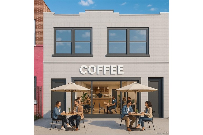 Rear view of property featuring brick siding