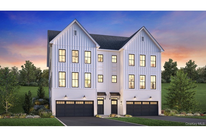 Modern inspired farmhouse featuring board and batten siding, roof with shingles, driveway, and a garage