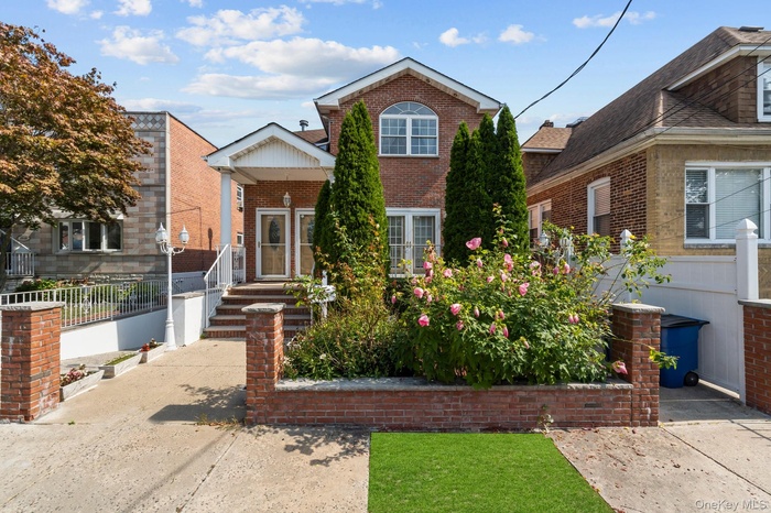 Traditional home with brick siding