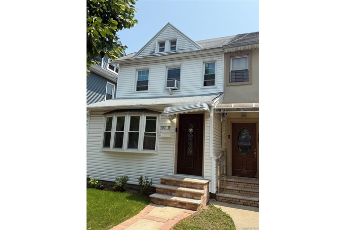 View of front of house with entry steps
