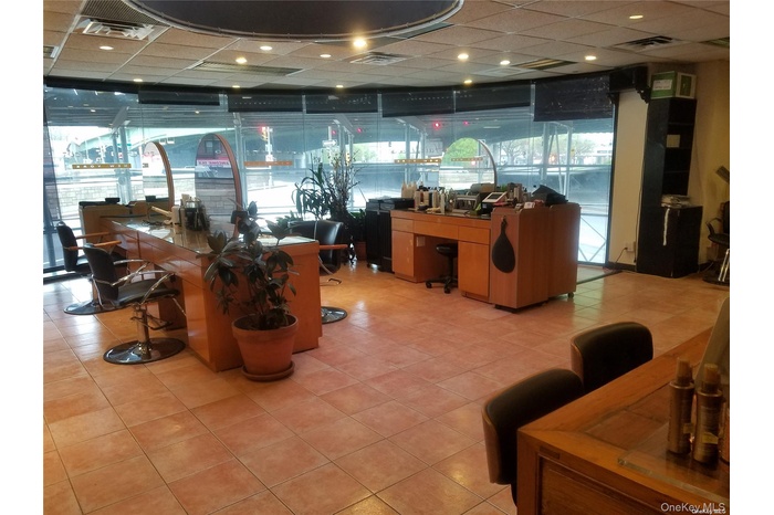 Community lobby featuring a drop ceiling