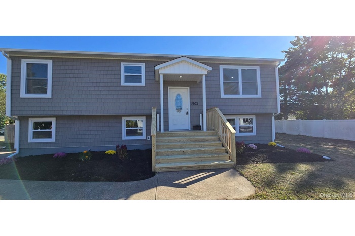 View of split foyer home