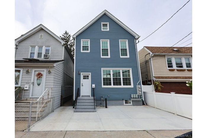 View of front of house with a patio