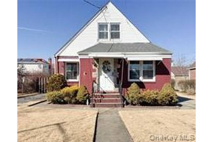 Bungalow featuring a porch