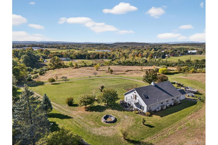 View of barndominium on 3 acres looking toward the additional 4.37 acre parcel that is available for $225k.