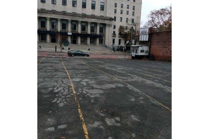 View of uncovered parking lot