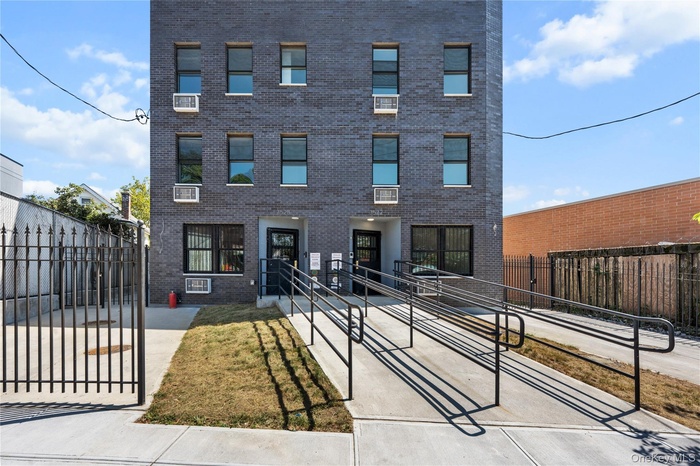 Contemporary home with brick siding