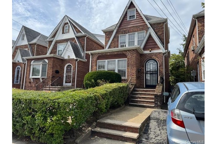 Tudor house with brick siding