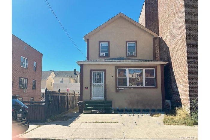 View of front of property with stucco siding