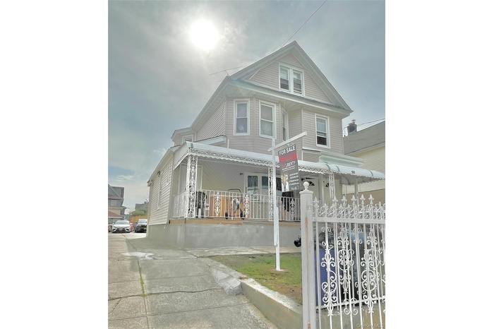 View of front of property featuring covered porch