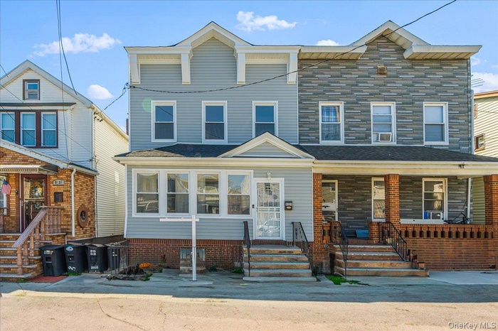 View of front of property featuring a porch