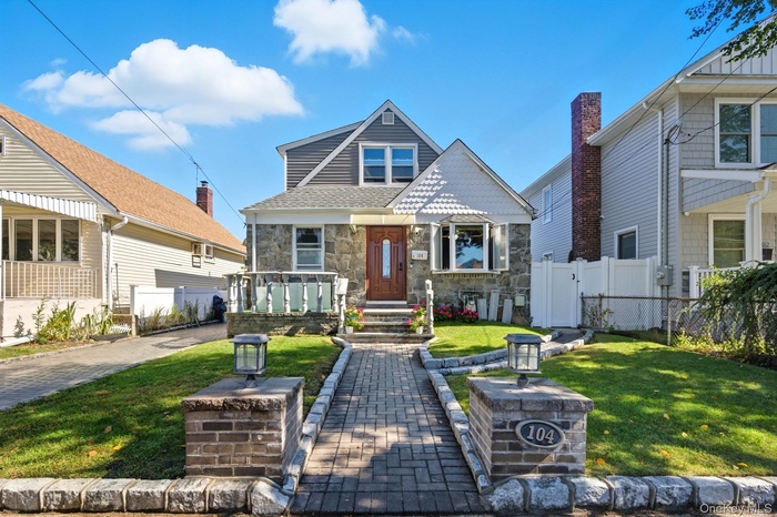 View of front of house featuring stone siding