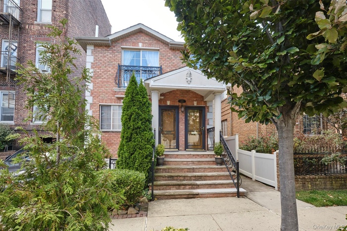 View of front of property with brick siding
