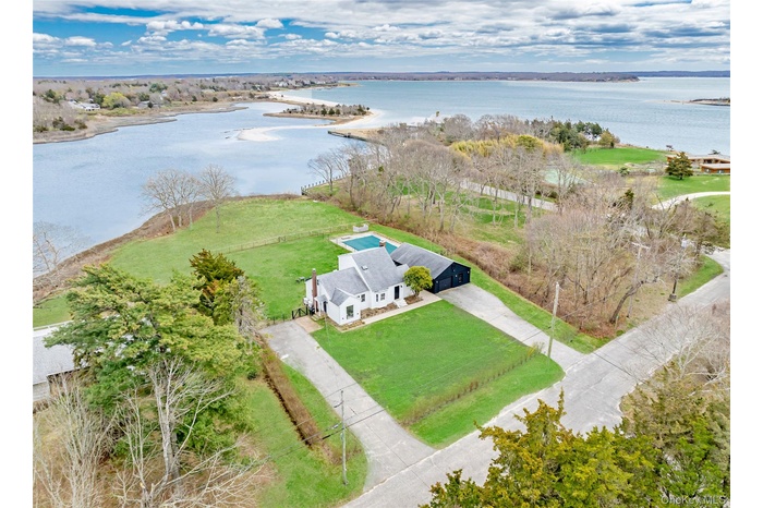 View from above of property with a large body of water