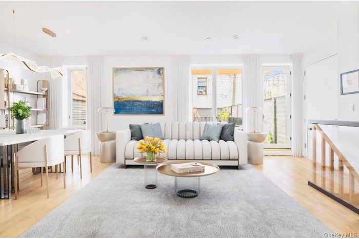 Living area featuring light wood-style floors