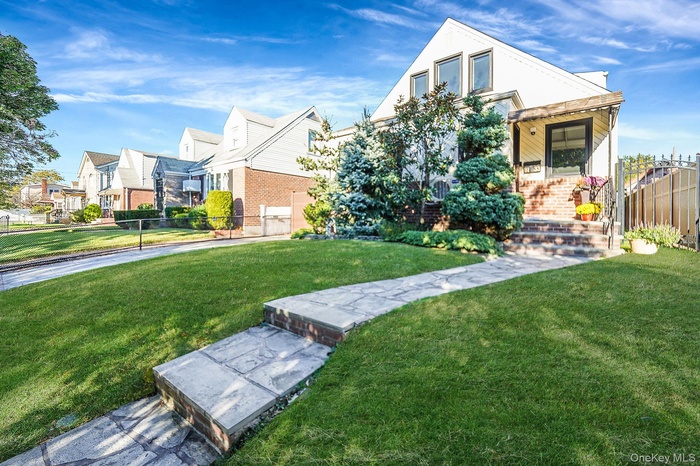 View of front of property with a residential view