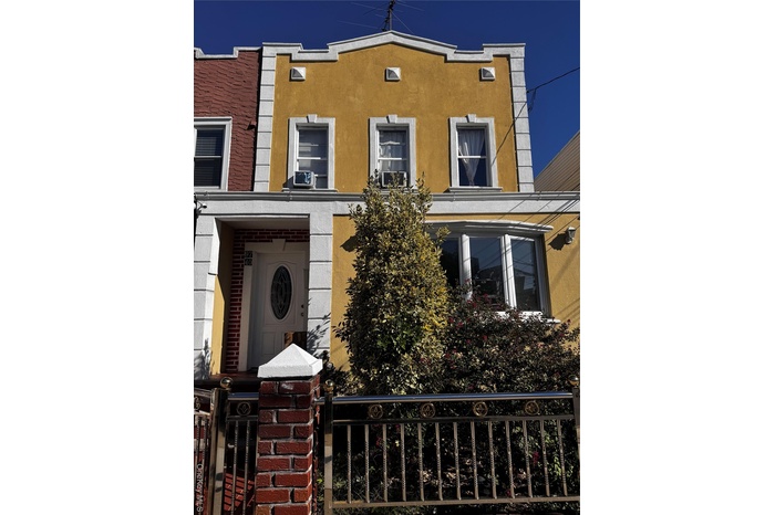 View of front of home with stucco siding