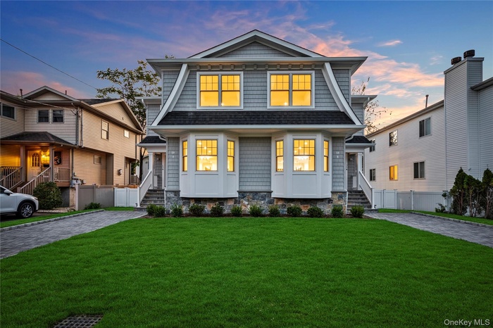 View of shingle-style home