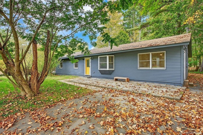 View of front of home featuring a patio area