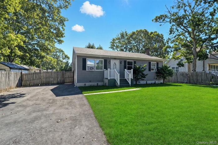 View of front facade featuring a chimney