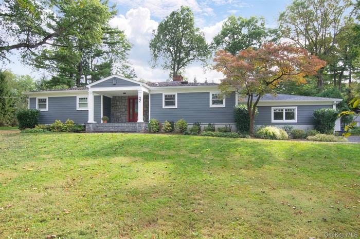 Completely updated 1 level living ranch style home set on almost an acre.