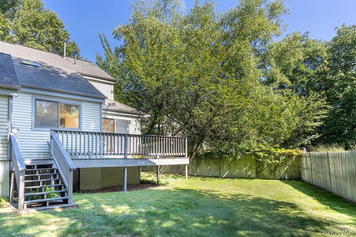 1001 Hunters Run, - corner unit and one-of-a-kind fenced-in backyard