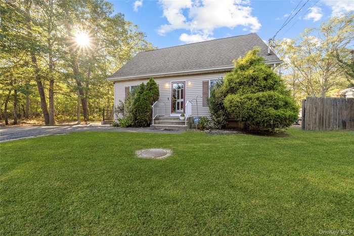Cape cod home with roof with shingles