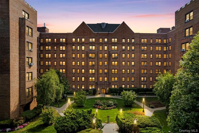 View of property at dusk - Digital