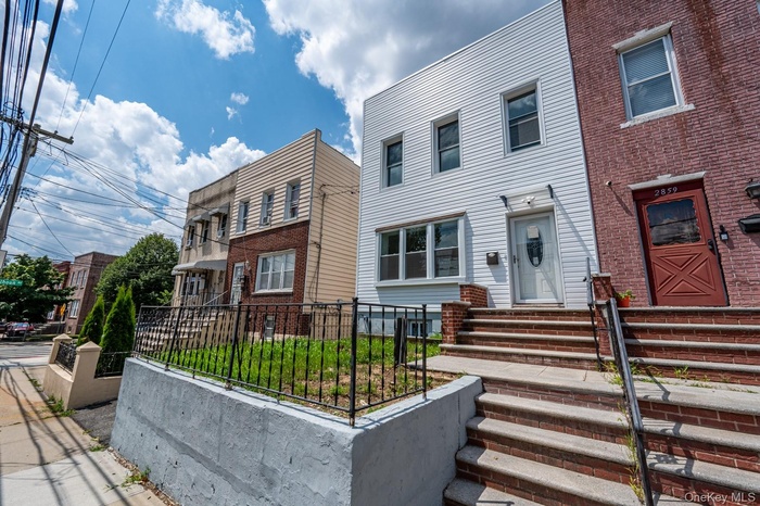View of front of property with a fenced front yard