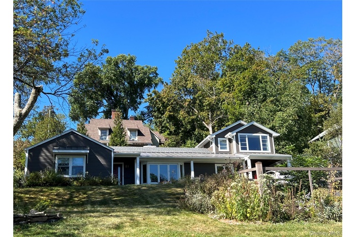 Private single family home with bridge views and mature gardens