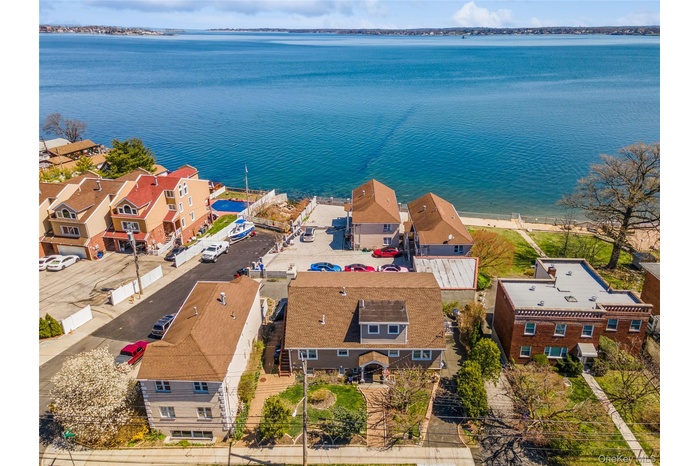 Aerial view with a water view and a residential view