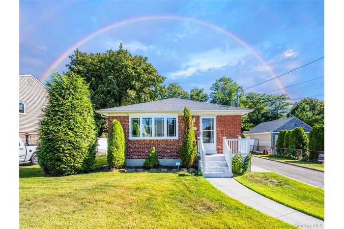 View of front of property with brick siding