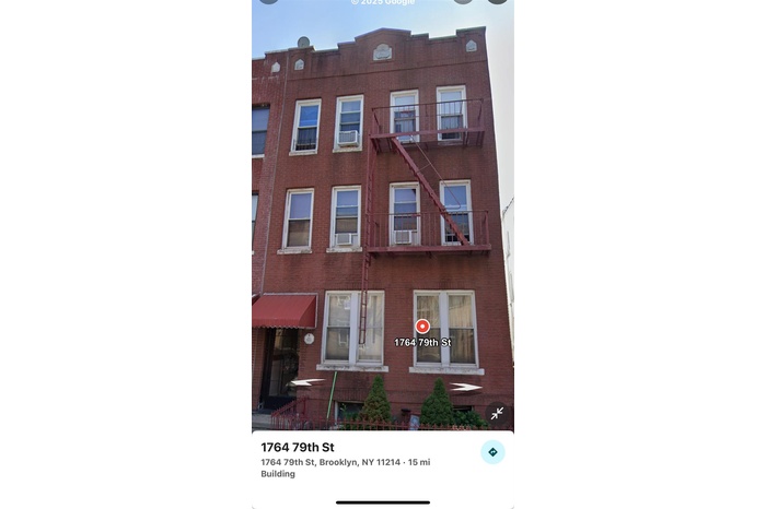 View of apartment building / complex with cooling unit