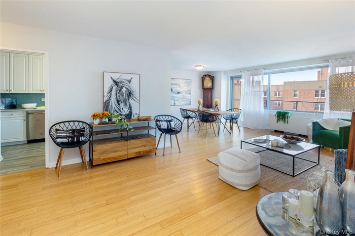 Living room featuring light wood-style flooring