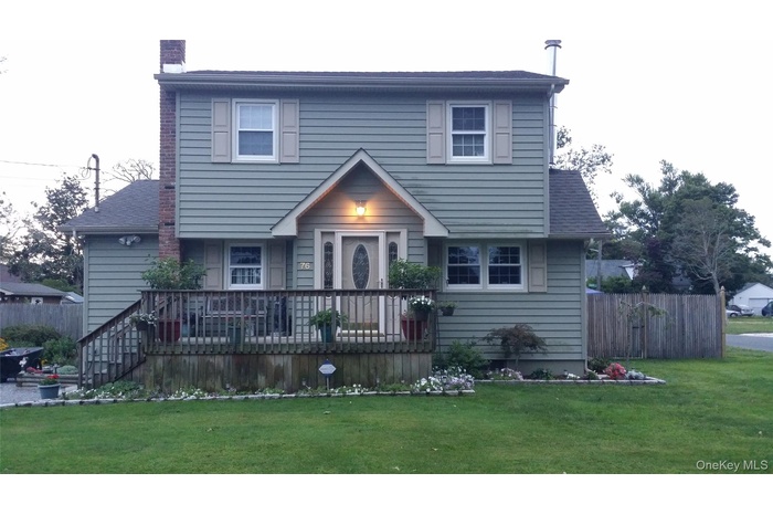 View of front of property with a chimney