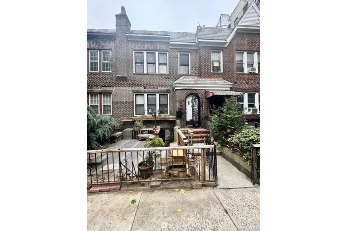 View of front facade with brick siding