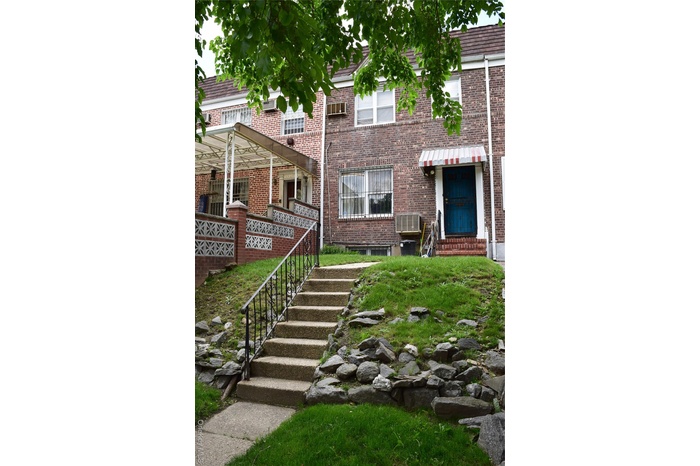 View of front of home featuring brick siding and entry steps