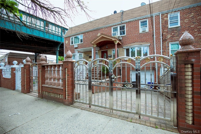 Gate with a fenced front yard