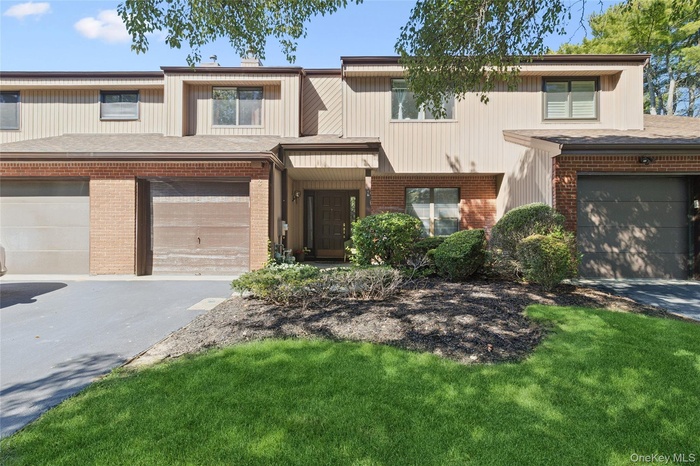 View of front facade with garage