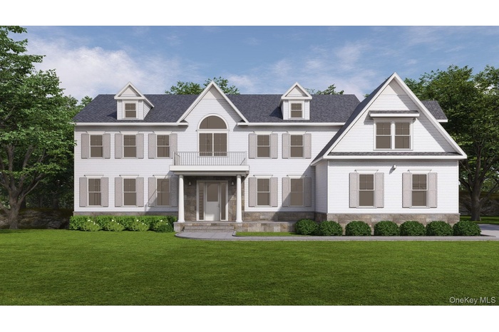 View of front of property with a front yard and a shingled roof