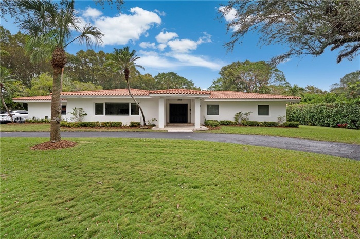 Front of the house with front yard