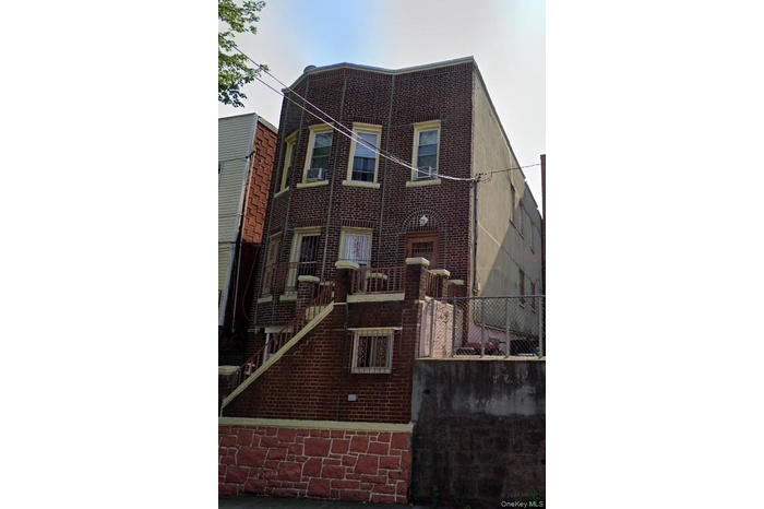 View of front of home with brick siding