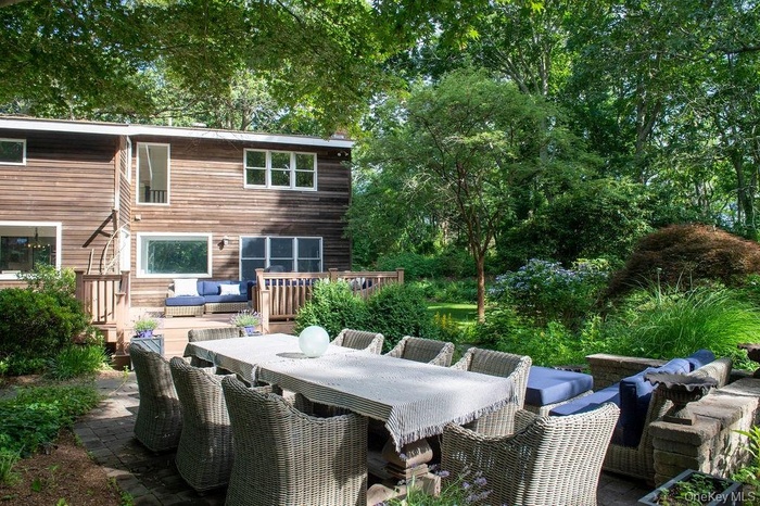 View of patio / terrace with outdoor dining area, an outdoor living space, and a deck