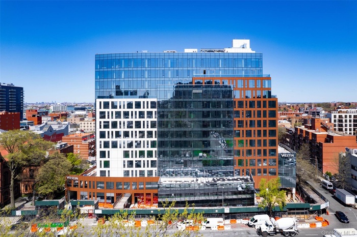View of building exterior featuring a view of city